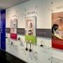 C1036 - Recognition Wall Display with Cable Suspended Graphics, Signage, and Shelves