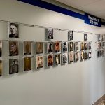 H1014 — World War II Veteran Memorial Wall Display Suspended with Rod Systems by Unity Medcenter